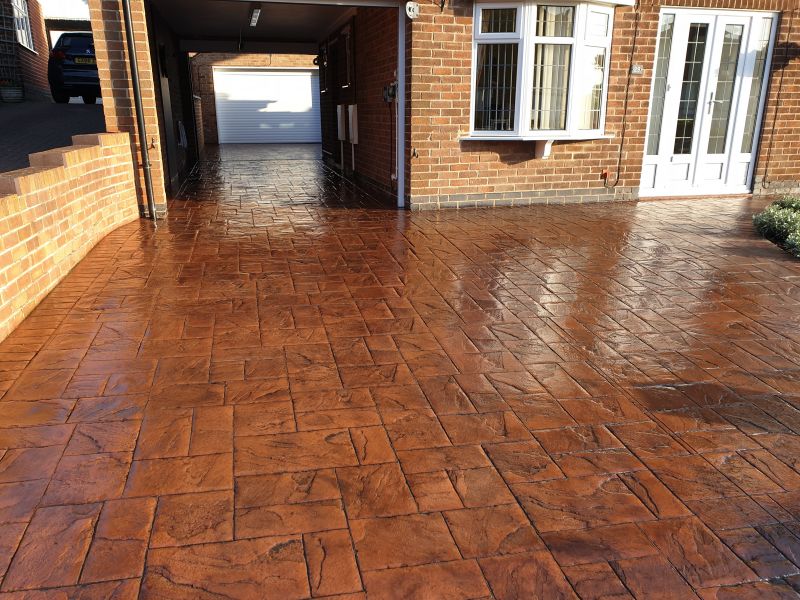 Printed concrete driveway cleaned and  re-sealed in Ilkeston: Swipe To View More Images