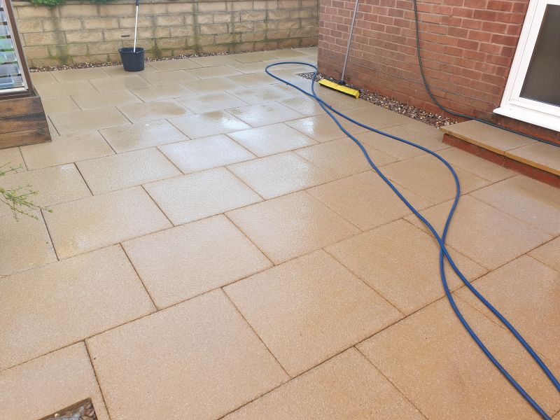 Slabs after being pressure washed and soft wash treatment applied in Wollaton: Swipe To View More Images