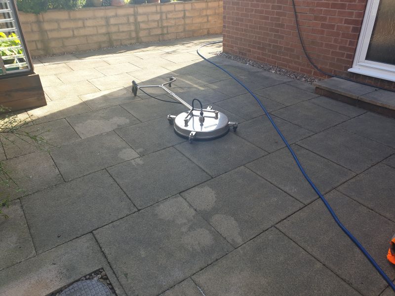 Slabs before being pressure washed and soft wash treatment applied in Wollaton: Swipe To View More Images
