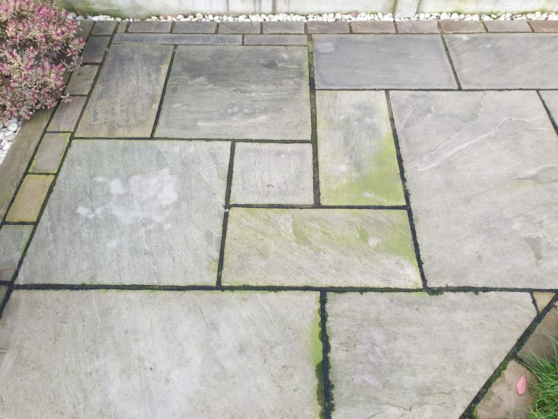 Indian sandstone before having a soft wash treatment applied in Ilkeston: Swipe To View More Images