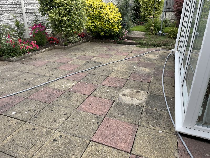 Slabbed patio before being cleaned in Giltbrook, Nottingham : Swipe To View More Images