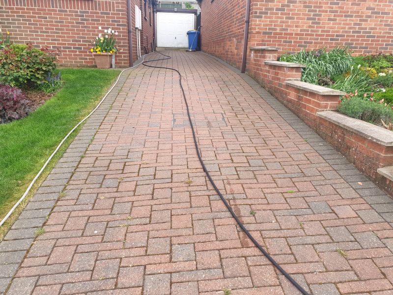 Block paving before being pressure washed and re-sanded in Ilkeston : Swipe To View More Images