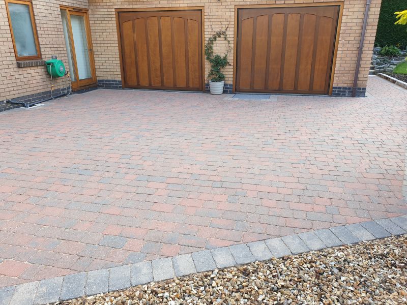 Block paving driveway after being pressure washed and re-sanded in Ilkeston : Swipe To View More Images