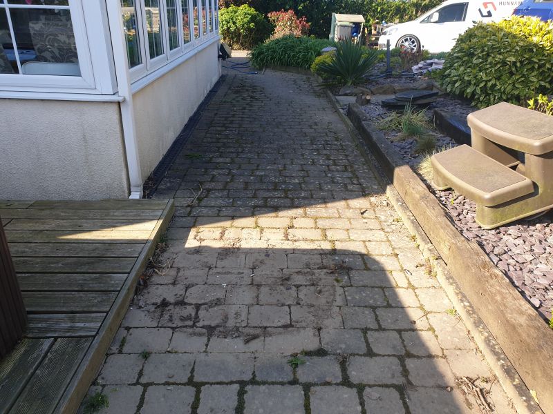 Block paving path before being pressure washed and re-sanded in Awsworth: Swipe To View More Images