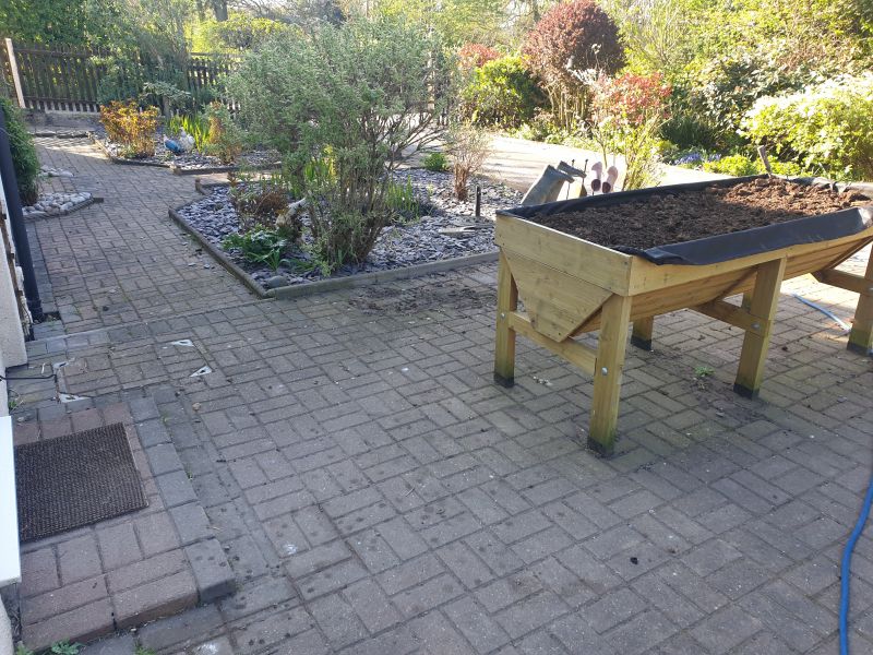 Block paving patio before being cleaned and re-sanded in Awsworth: Swipe To View More Images