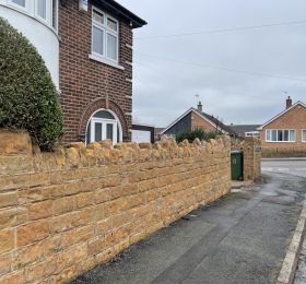 Stone wall in Langley mill, Derbyshire after being cleaned : Click Here To View Larger Image
